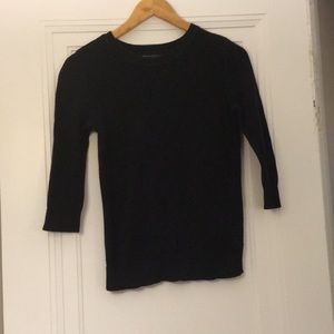 Black sweater with monochrome floral detail